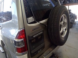 2001 MISTSUBISHI MONTERO, GOLD,, LIMITED MODEL, 3.5L, AT, 4WD.  Z26371